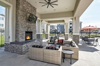 Covered Fireside Lounge with Fireplace at Beautiful Apartments for Rent in Colorado Springs